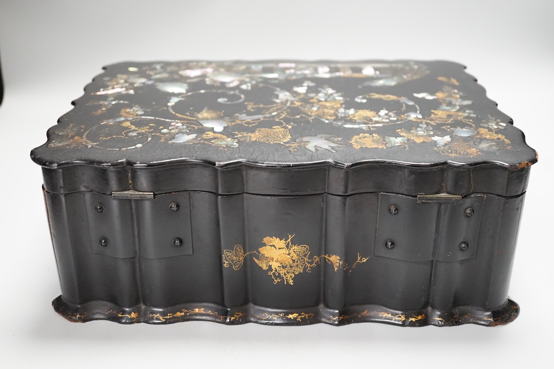 A Victorian papier mache workbox and contents, 32cm